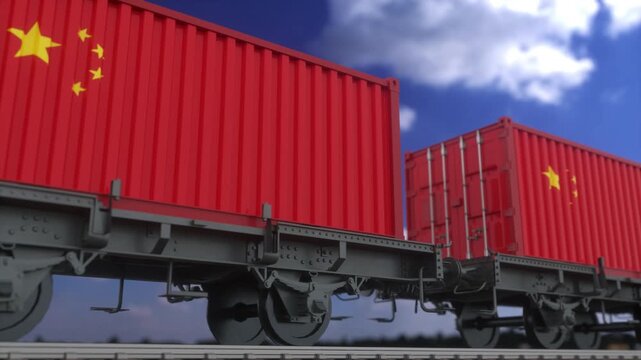 Red Shipping Containers with Chinese Flag on Moving Railway Freight Train