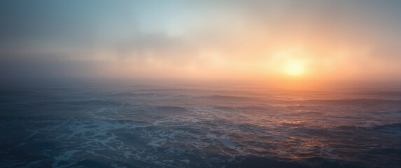 Fototapeta premium foggy sunset over the ocean sky