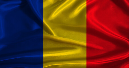 Fototapeta premium Romania flag with cloth textured background. National flag of Romania with realistic texture