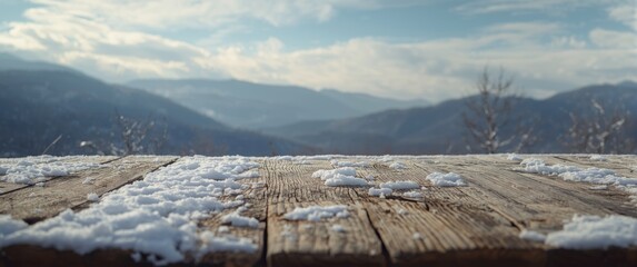 Naklejka premium Snow-covered antique wooden table featuring space for decorations in a winter mountain setting