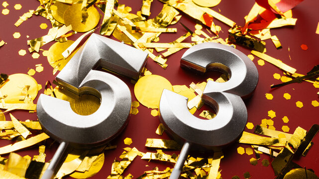 Number 53 celebration birthday digit on Red festive with confetti background. fifty-three year birthday. concept of birthday, anniversary and date.