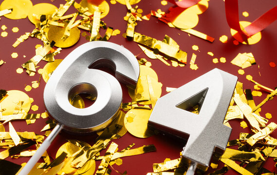 Number 64 celebration birthday digit on Red festive with confetti background. sixty-four year birthday. concept of birthday, anniversary and date.