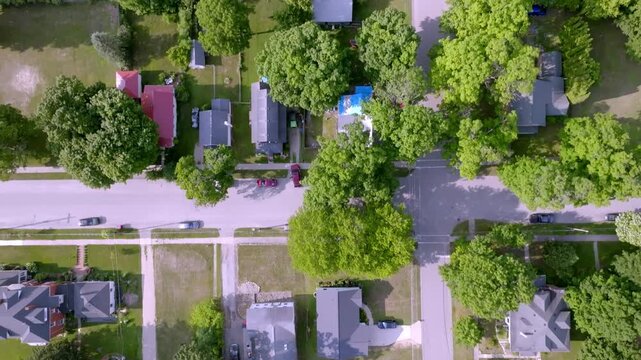 Neighborhood homes in Newaygo, Michigan with drone video overhead.