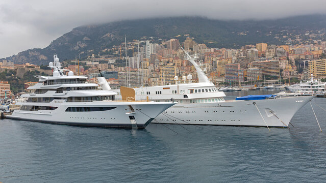 Two Luxury Super Yachts Moored at Hercule Port in Monaco Calm Winter Day