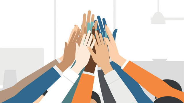 Unified hands joining in teamwork celebration in modern office setting