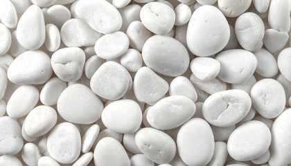 Fototapeta premium Collection of white pebbles filling the frame from a top-down viewpoint