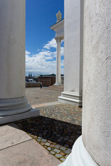 Neoclassical Architecture of Helsinki Cathedral Pillars Overlooking Senate Square with Historic White Columns and Cobblestone Square