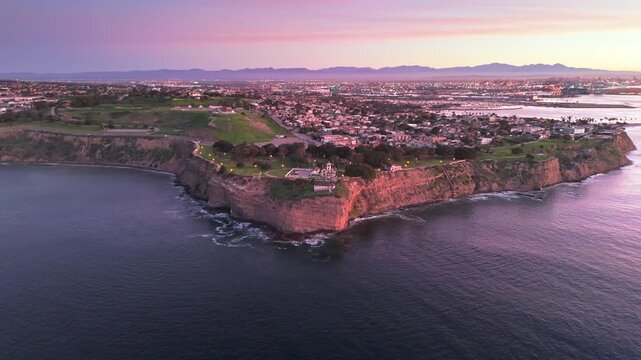 High aerial orbit shot of Point Fermin at blue hour