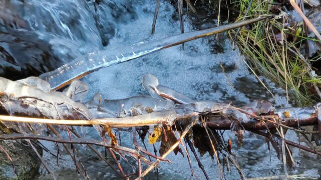 Ice and frost on the stream in winter.