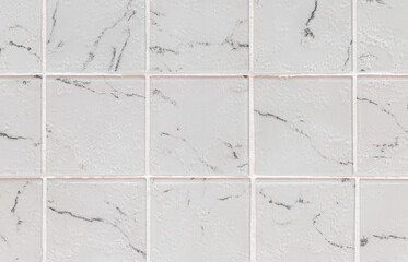White stone squares tile pattern wall