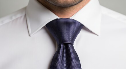 Man Wearing White Shirt and Navy Tie.