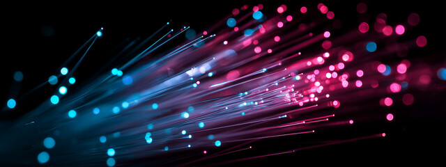 Macro of glowing fiber optic cables for high speed data transfer and global internet network concepts