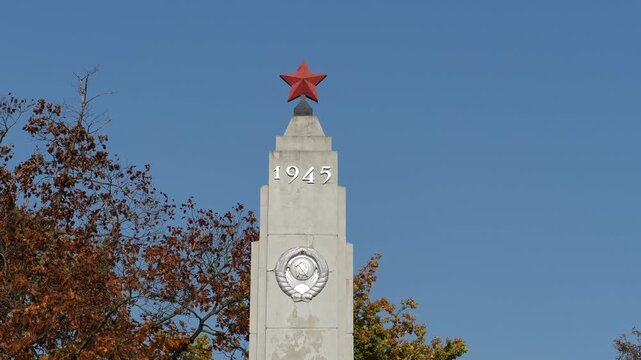 Monument with red soviet star dedicated to the memory of red army soldiers