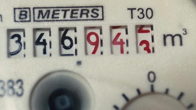 Analog water consumption meter is measuring water usage.