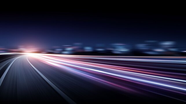 Streaks of color race along an empty road under a dark sky, revealing the energy of a city that never sleeps. Bright lights shine in the distance, creating a vivid scene of movement and life