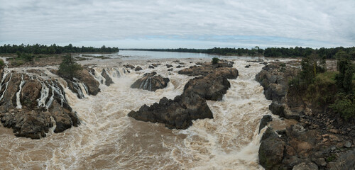 Panoramic view of broad river and numerous cascades at Khone Phapheng Waterfall. © Hanoi Photography