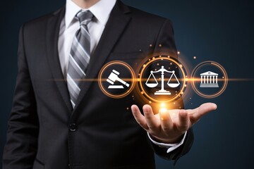 Businessman Holding Legal Icons: Gavel, Scales, and Courthouse