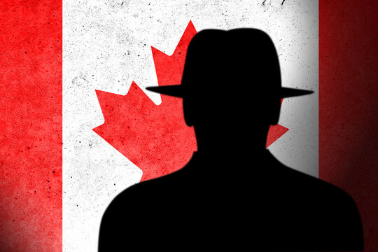 Canada spy and hackers launch cyber attacks. Hackers violate privacy. Hacker is searching  personal data. Social media data breaches