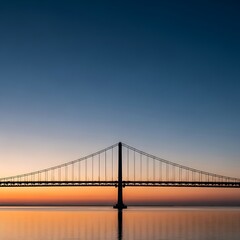Sunset over a large suspension bridge.