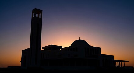 Obraz premium Silhouette of mosque at sunset.