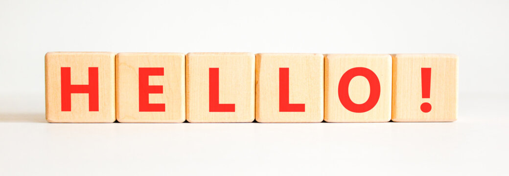 Hello welcome support and help symbol. Concept word Hello on beautiful wooden blocks. Beautiful white background. Business psychological hello support and help concept. Copy space.