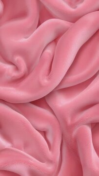 Vertical video: Shifting pink satin fabric rippling folds across 5 frames in studio showing sheen
