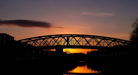 Obraz premium Silhouette of bridge at sunset landscape.