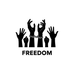 Fototapeta premium The struggle for freedom depicted by chained hands amidst other raised hands