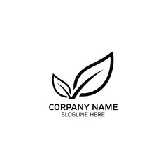 Obraz premium A minimalist logo design featuring leaves on a black background