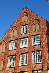 Obraz premium Lubeck in region Schleswig-Holstein, Germany. Hanseatic City. Old Town architecture in Backsteingotik style (Brick Gothic style).