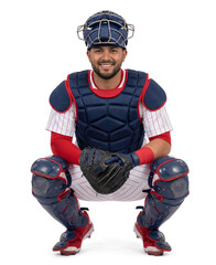 Portrait of a male baseball player in red and blue catcher equipment squatting, smiling