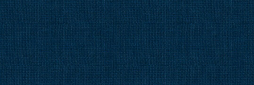 Dark blue fabric cloth texture banner. Seamless woven textile background pattern.