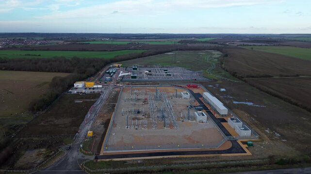 Aerial view of the Biggleswade National Grid substation, showcasing the intricate network of power lines and equipment, Biggleswade, Biggleswade, United Kingdom.
