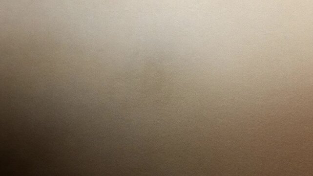 Capturing camera moving closer to blurred beige surface in room, obstruction causing soft defocus