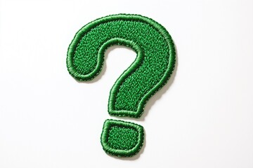 Green embroidered question mark patch isolated on white background.