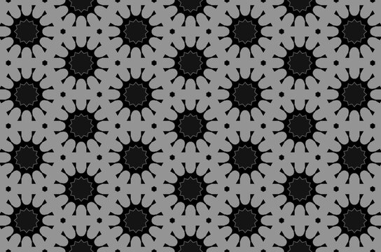 A background pattern of black and gray circles