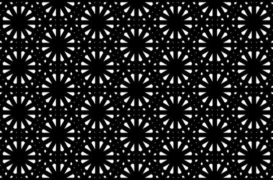 A black and white photo of a pattern of circles