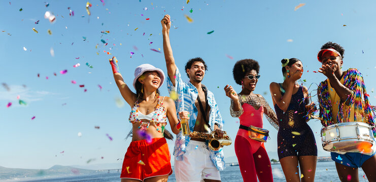 Celebration on the beach with music and confetti