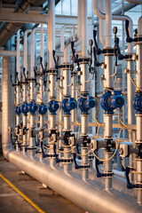 Fototapeta premium High-tech agricultural greenhouse infrastructure with water distribution pipes automated control systems. Advanced hydroponic greenhouse engineering with industrial communication, pumps, valve network