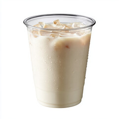 Iced soy milk in transparent plastic cup with condensation and ice cubes, refreshing cold beverage for hot days