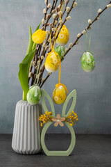 Decorative arrangement with eggs and flowers for Easter celebration in indoor setting at springtime