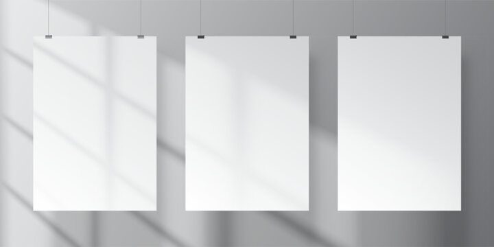 Realistic vector mockup of three white vertical A4 posters with soft shadows of window inside empty minimalistic interior. Print or product presentation template