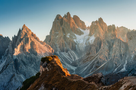 Alpine landscape of Cadini di Misurina with rugged mountain range during sunset in Dolomites, Italy