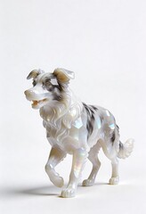 Intricate mother of pearl border collie figurine with detailed fur and expressive eyes