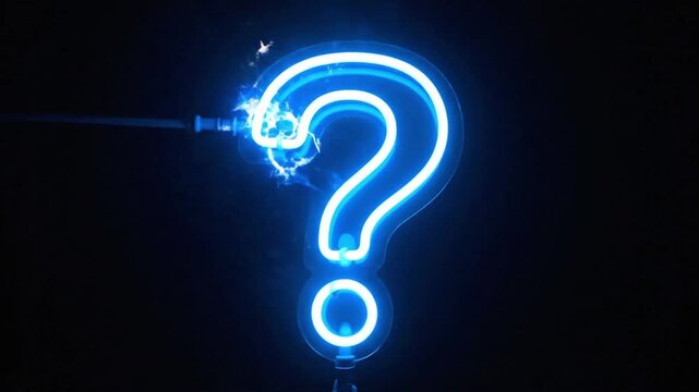 Glow of the blue question mark on a dark background in an unknown location during nighttime hours