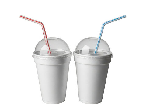 Two white disposable cups with straws and dome lids