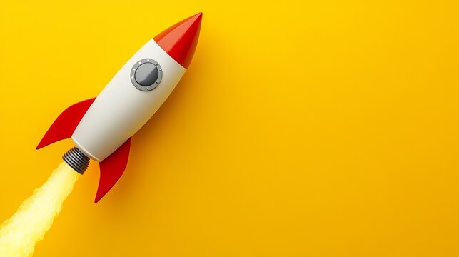 A toy rocket ship blasts off into the air with a bright yellow background