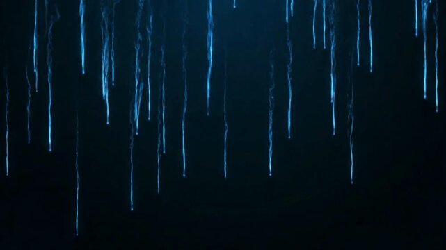 A cool, blue icicles against a dark background, the image evokes a sense of winter. 