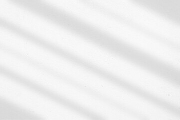 Blurred shadow lines from window with light on white concrete wall background. Shadow overlay effect on wall. Ideal for wallpaper, overlapping, mockup, backdrop. Shade background