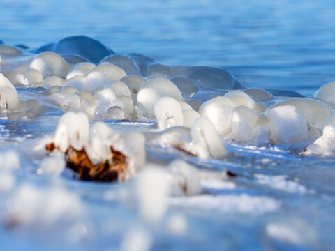 Ice mushroom - After an ice storm in Dallas, sunset lit up a river bank. Plants were covered by ice and snow flakes. It's so beautiful in this macroworld. Seasonal change tells me life will continue.